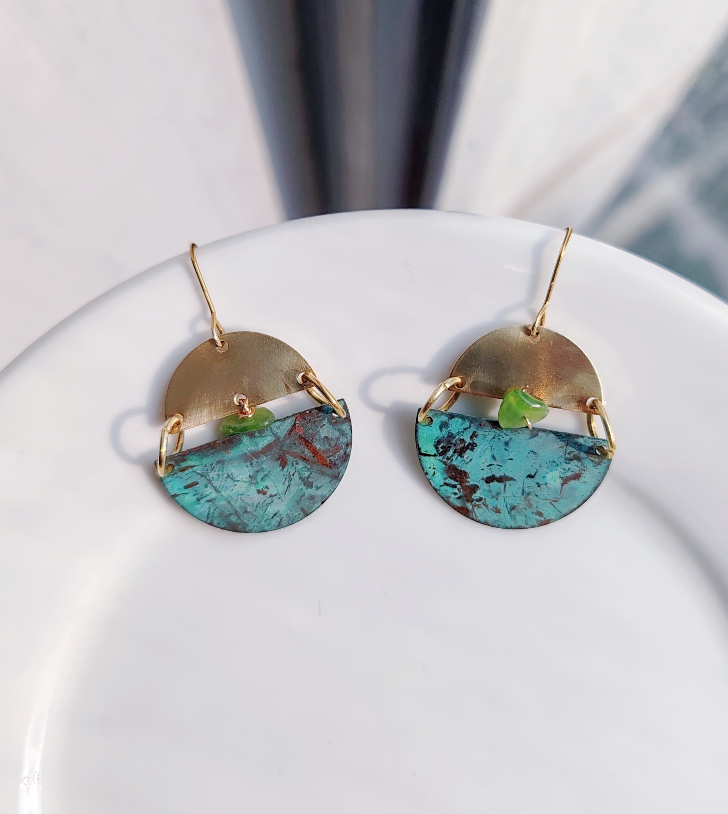 Blue Flame earrings collection, with yellow brass