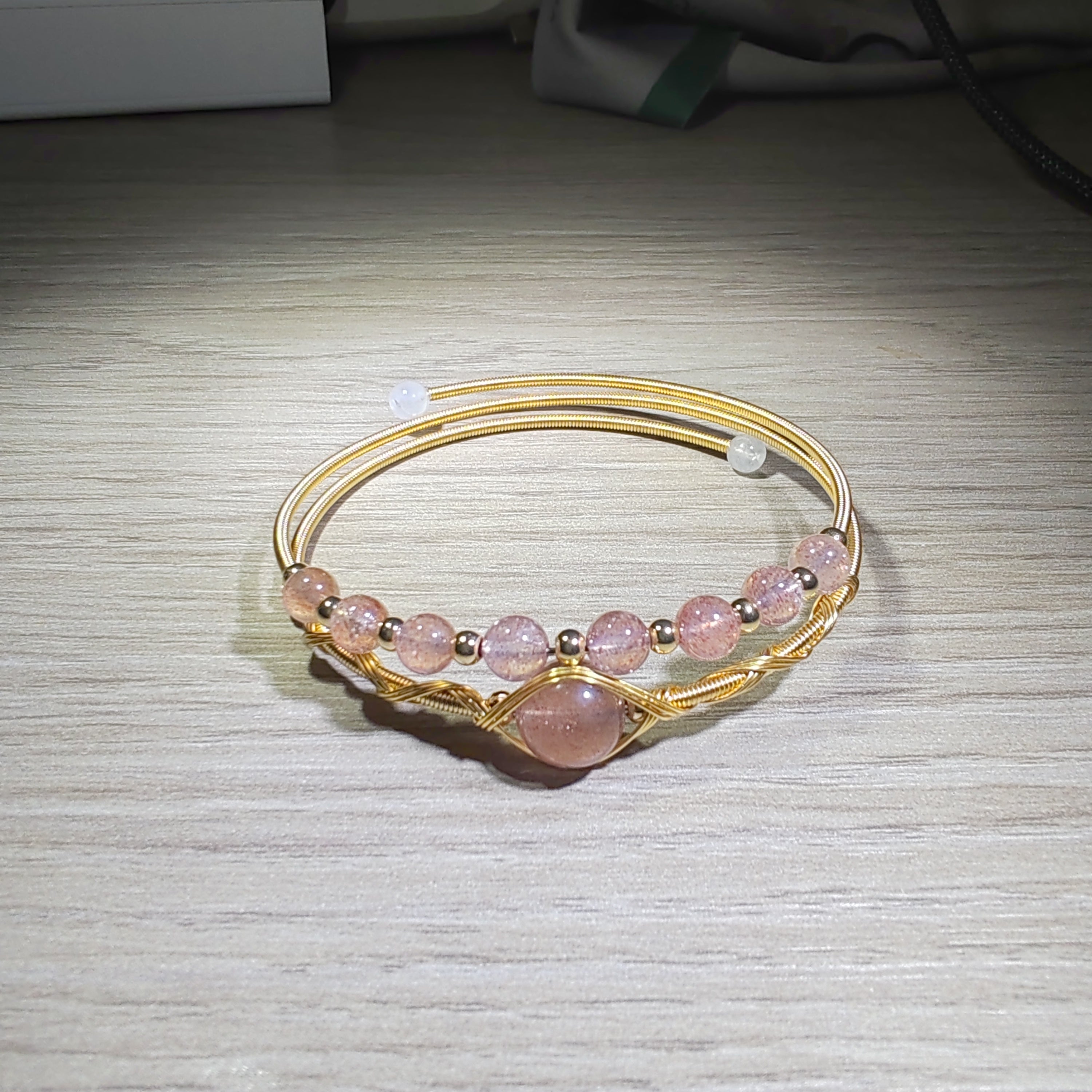 double circle wiring braclets strawberry quartz/moonstones