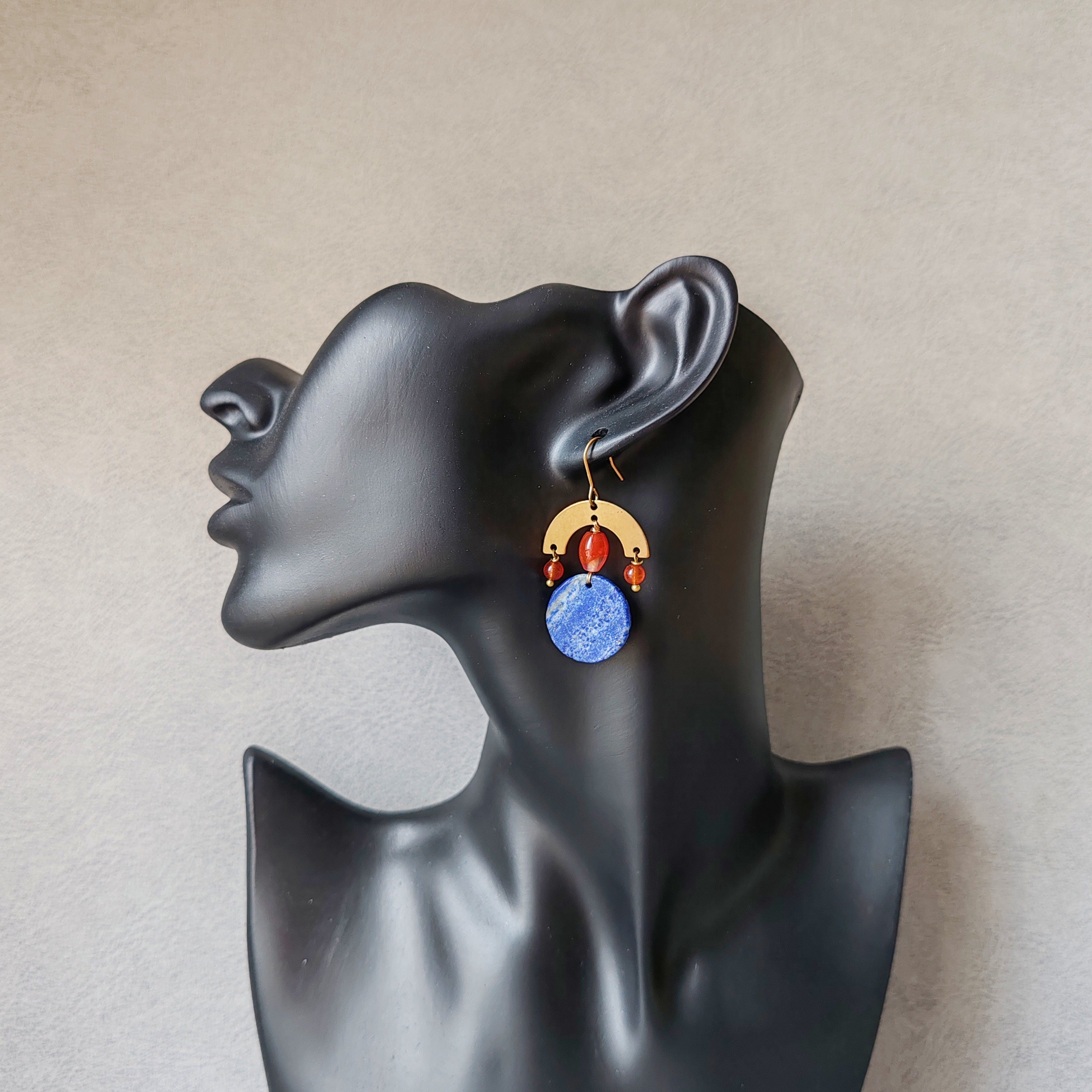 Brass and stone earrings, with lapis lazuli and red agate.