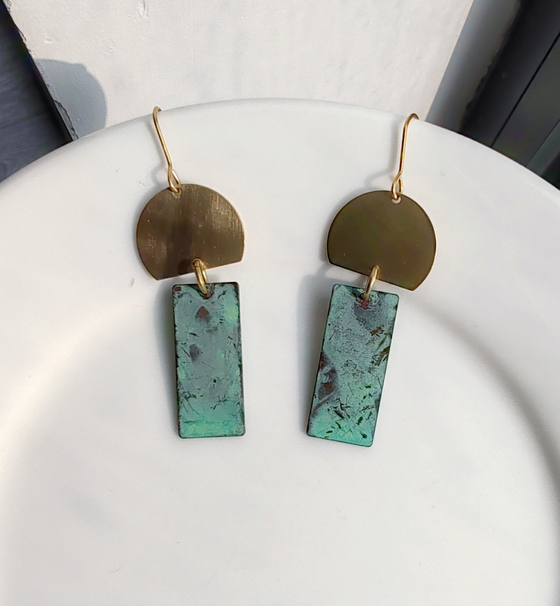 Blue Flame earrings collection, with yellow brass