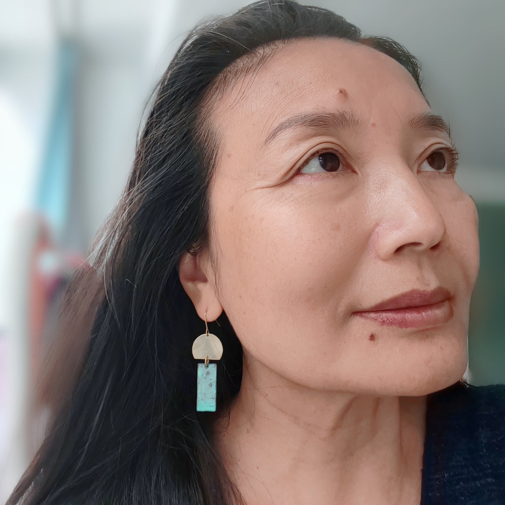 Blue Flame earrings collection, with yellow brass