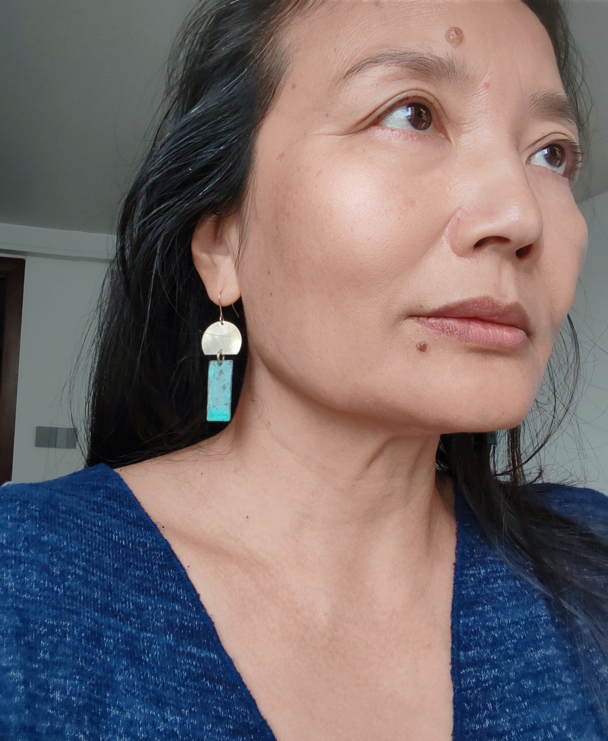 Blue Flame earrings collection, with yellow brass