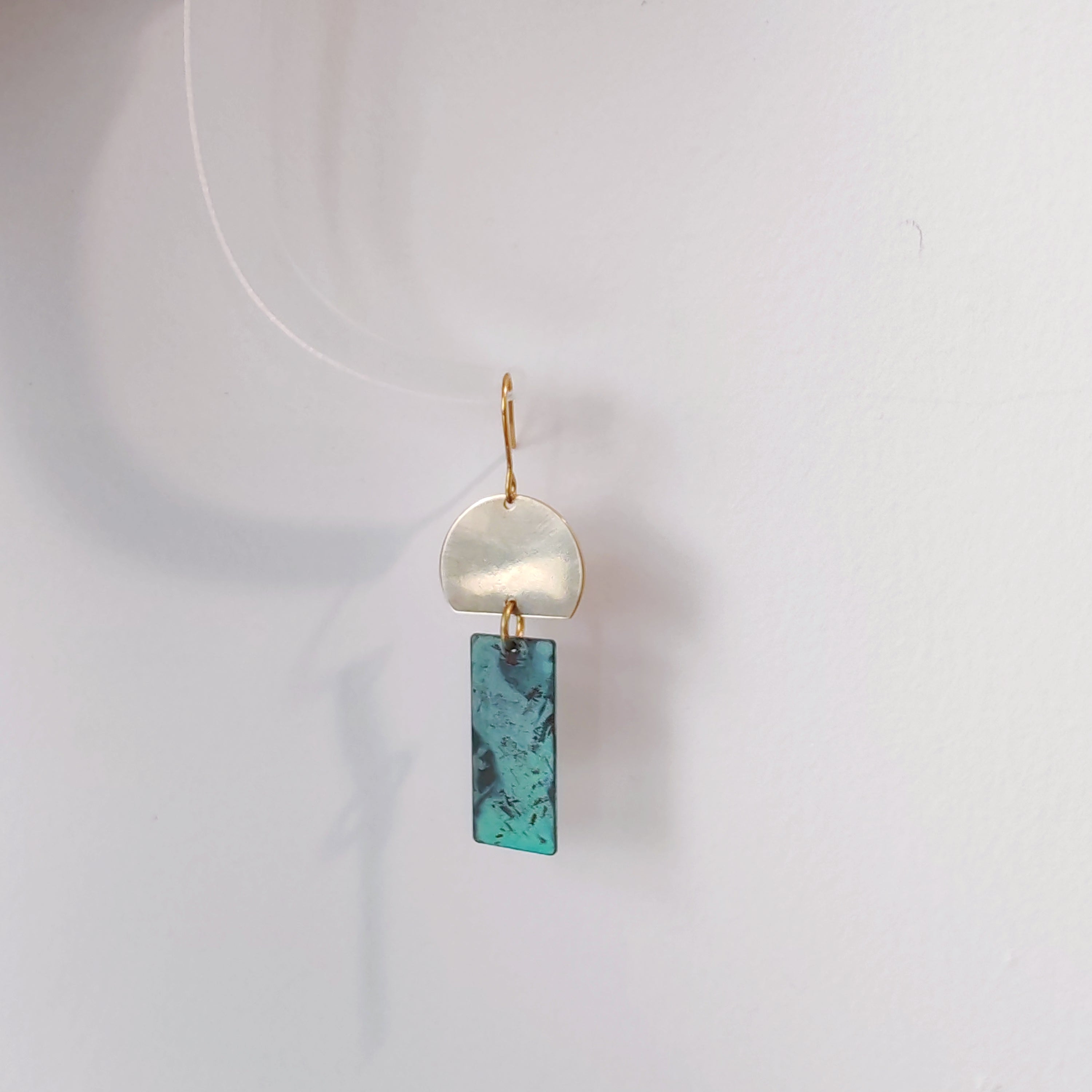 Blue Flame earrings collection, with yellow brass