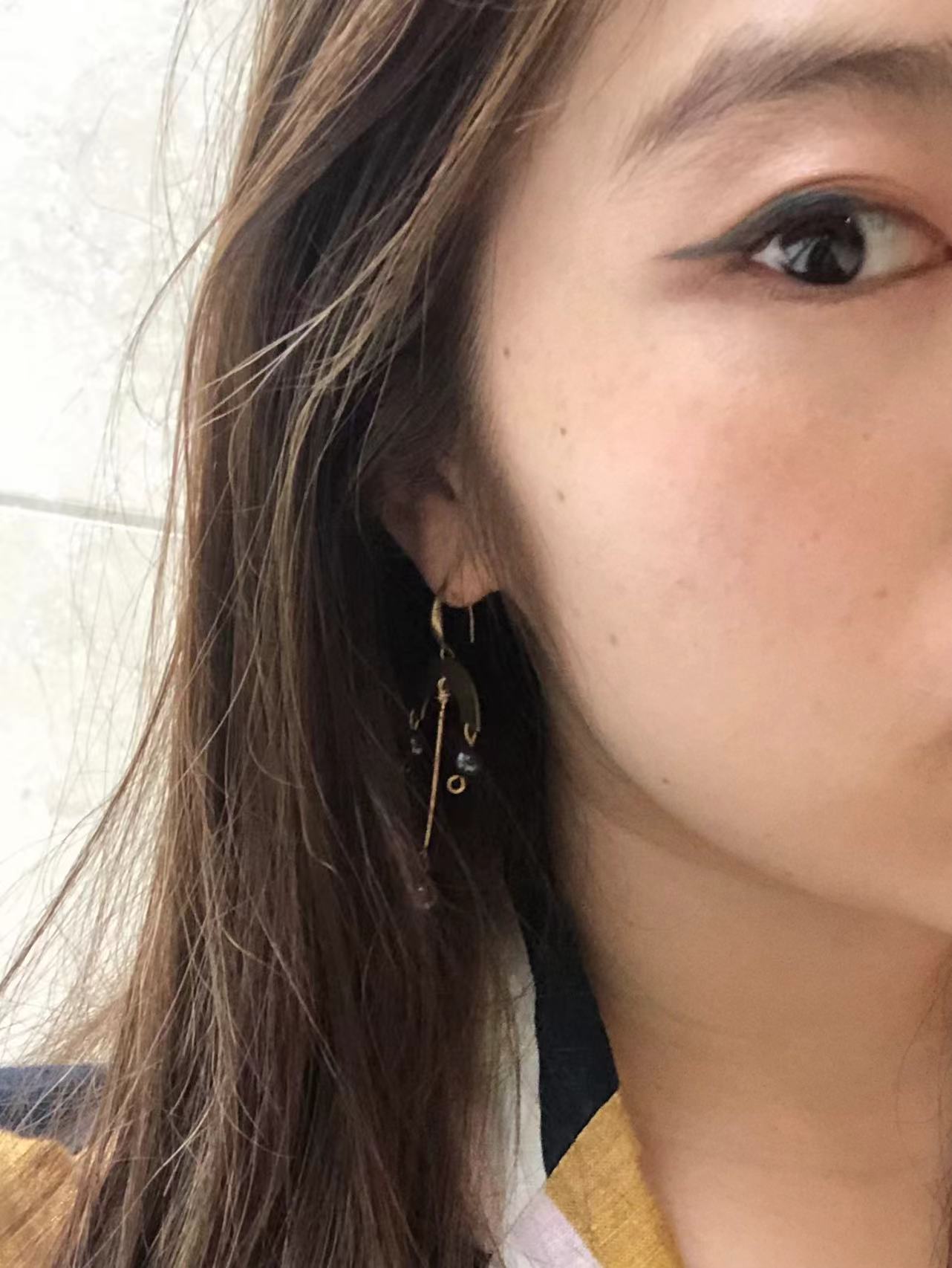 brass and helmitite earrings